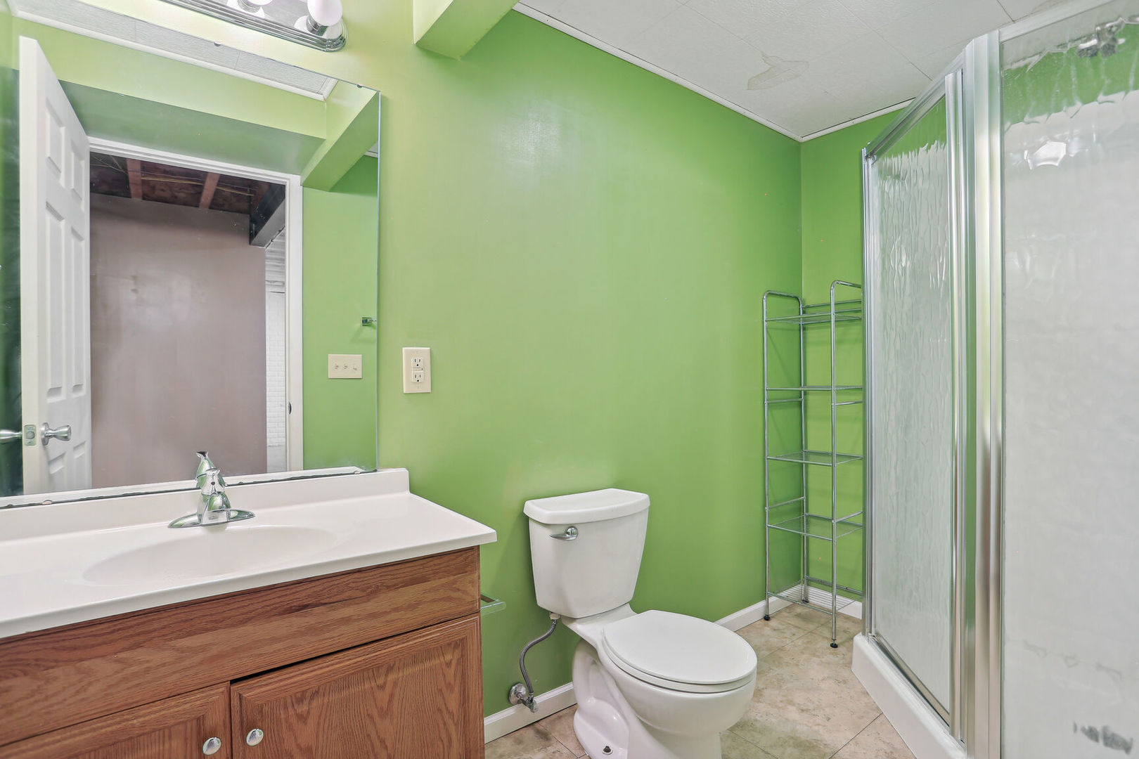 905 Switchgrass Lane Champaign, IL 61822 - Photo 34 of 51 a bathroom with a sink a toilet and shower