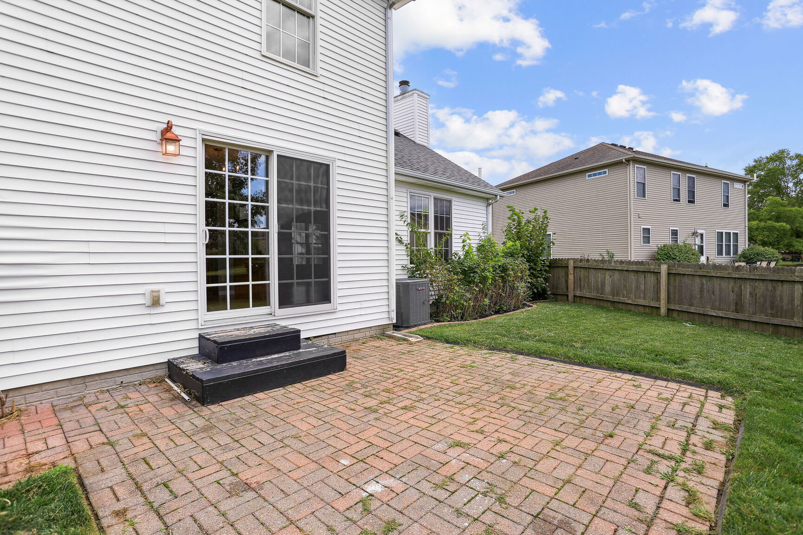 905 Switchgrass Lane Champaign, IL 61822 - Photo 41 of 51 a view of backyard with a garden