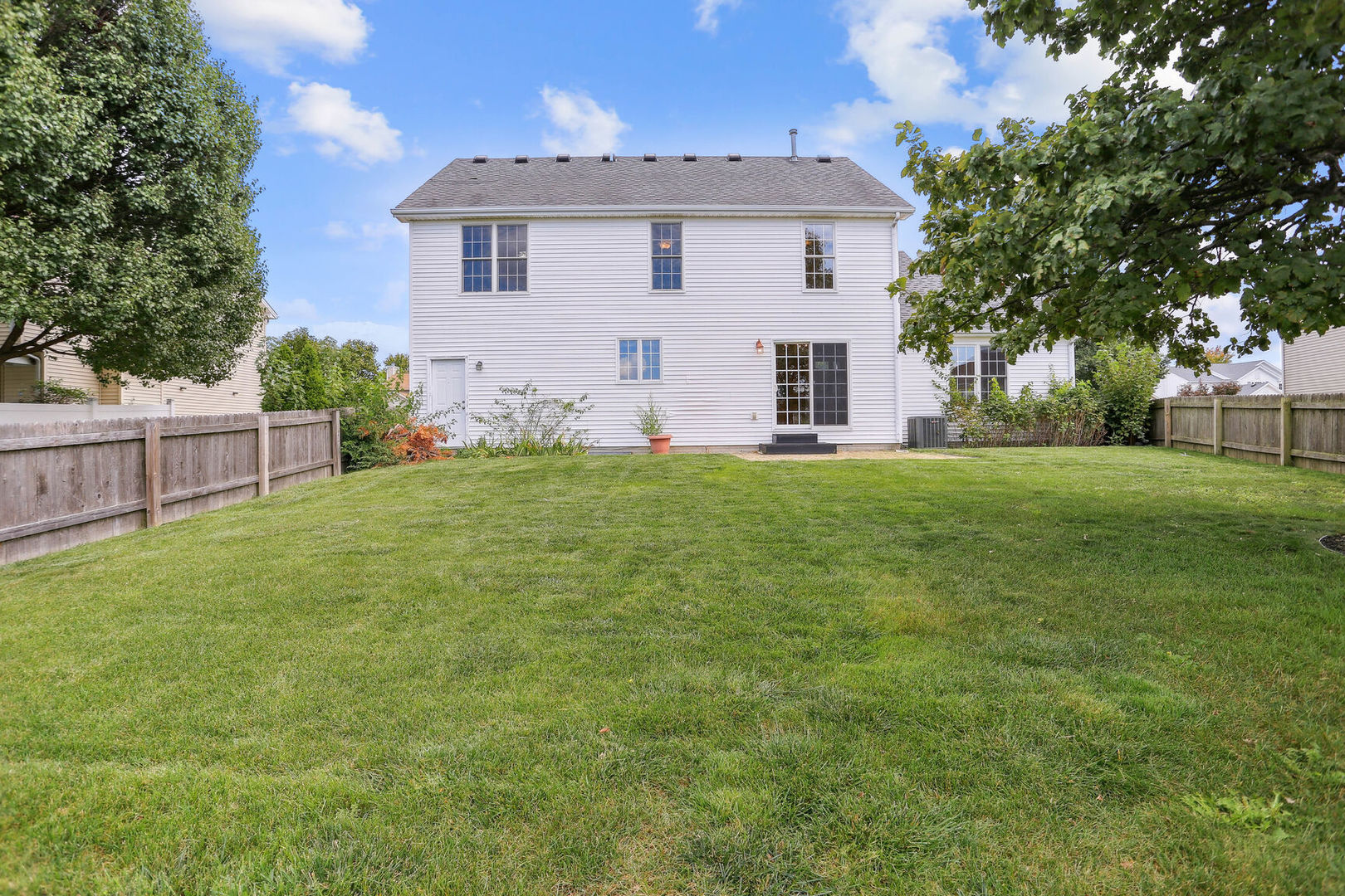 905 Switchgrass Lane Champaign, IL 61822 - Photo 44 of 51 a view of a house with a yard