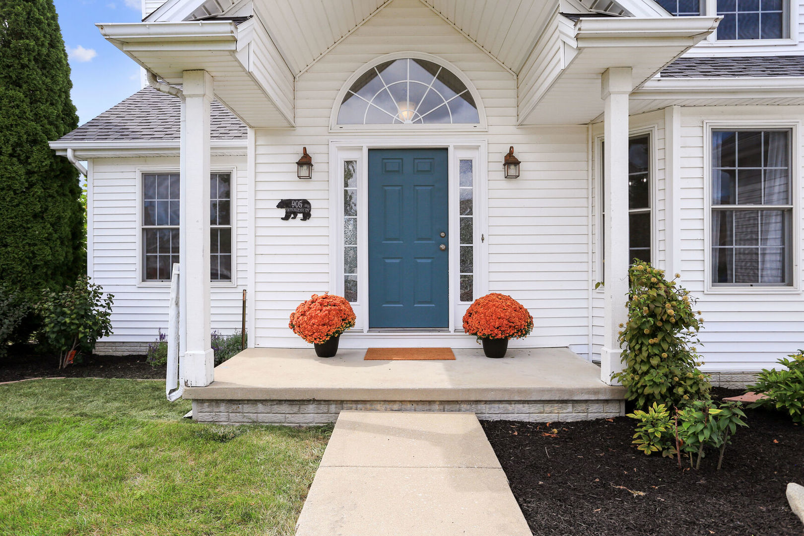 905 Switchgrass Lane Champaign, IL 61822 - Photo 5 of 51 a front view of a house with garden