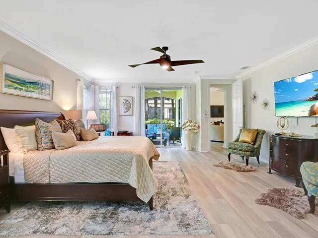 a bedroom with a bed and furniture