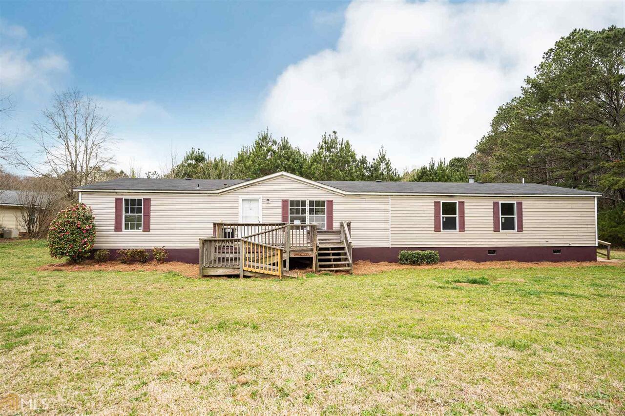 1341 Clack Road Madison, GA 30650 - Photo 1 of 1 a view of a house with a yard