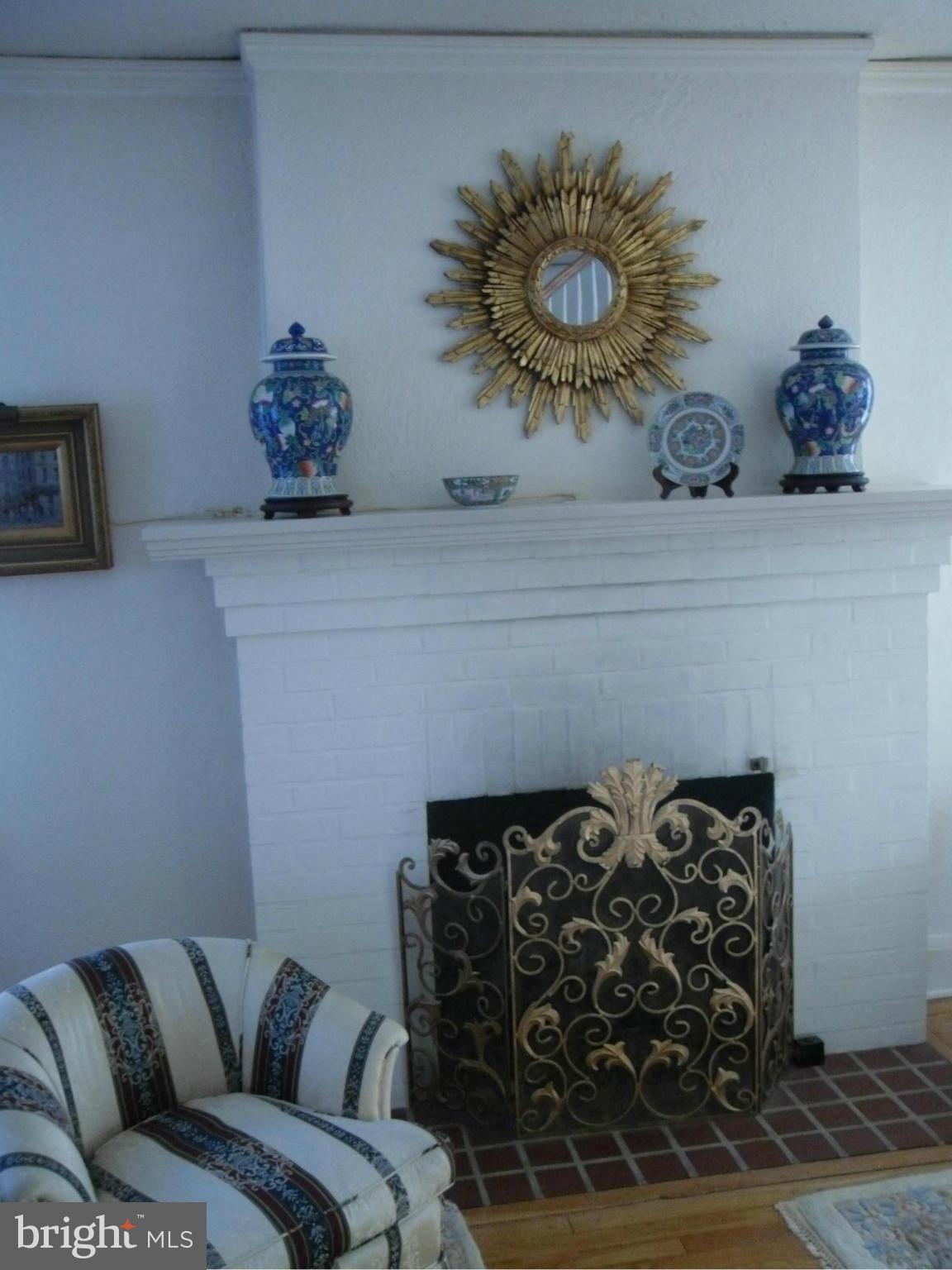 3804 Grantley Road Baltimore, MD 21215 - Photo 10 of 30 Living Room fireplace and mantle