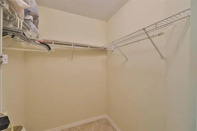 a view of a room with racks on the wall