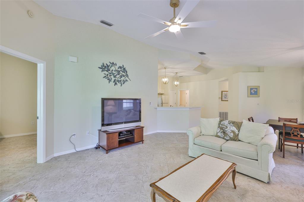 2431 Nantucket Harbor Loop, Unit 61 Sun City Center, FL 33573 - Photo 10 of 37 a living room with furniture