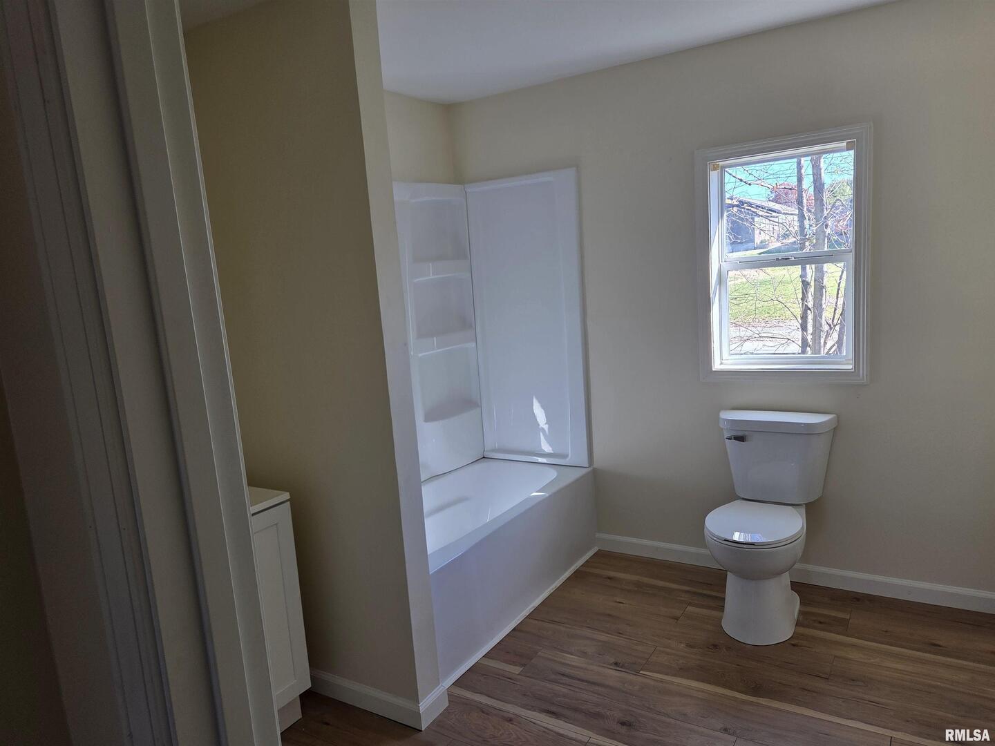 1207 North Market Street Marion, IL 62959 - Photo 13 of 20 a bathroom with a toilet and a sink