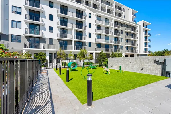 a view of building with yard