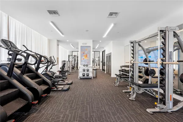 a view of a room with gym equipment
