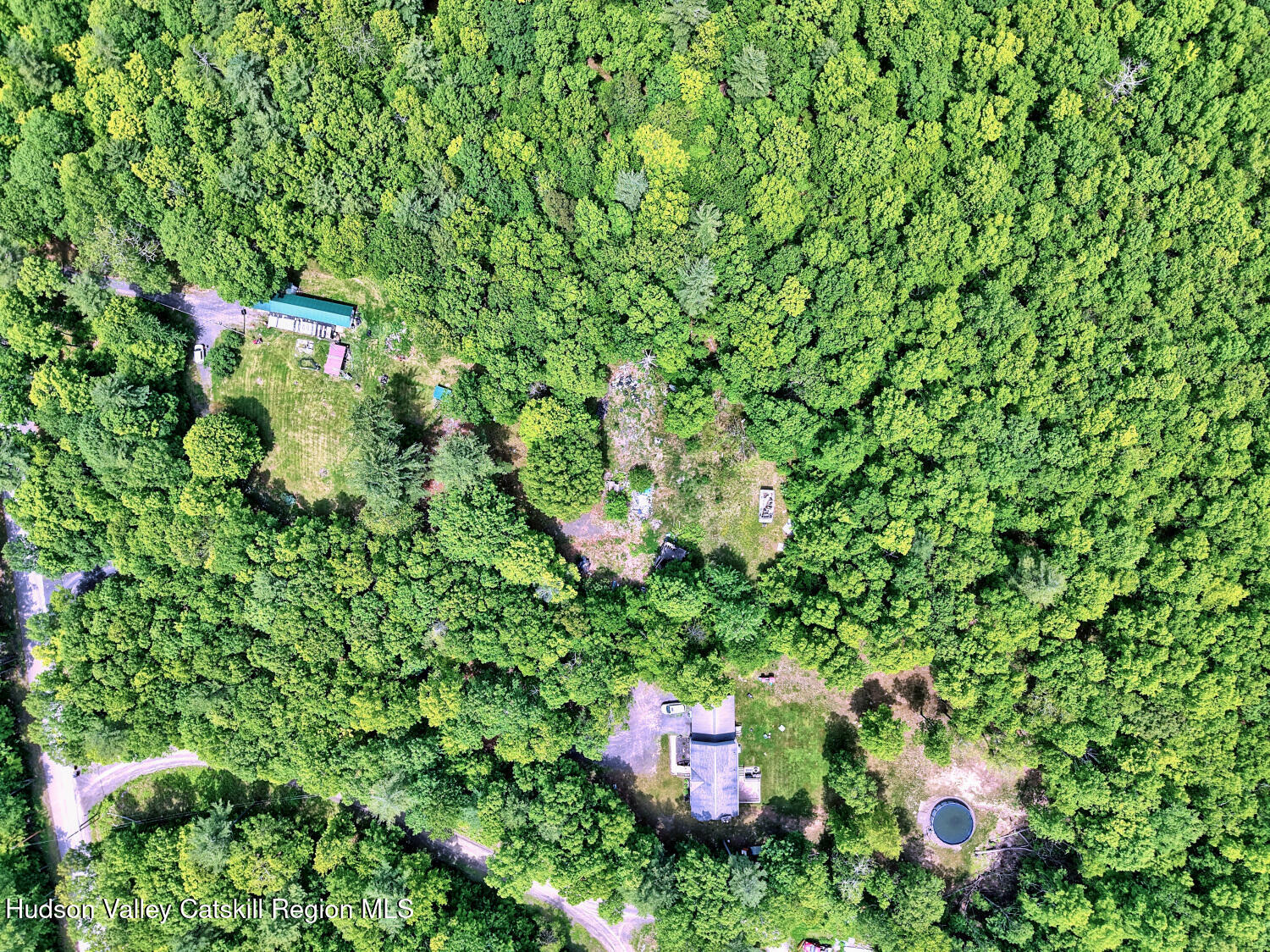 268 Potic Mountain Road Catskill, NY 12414 - Photo 29 of 33 a backyard of a house with a tree