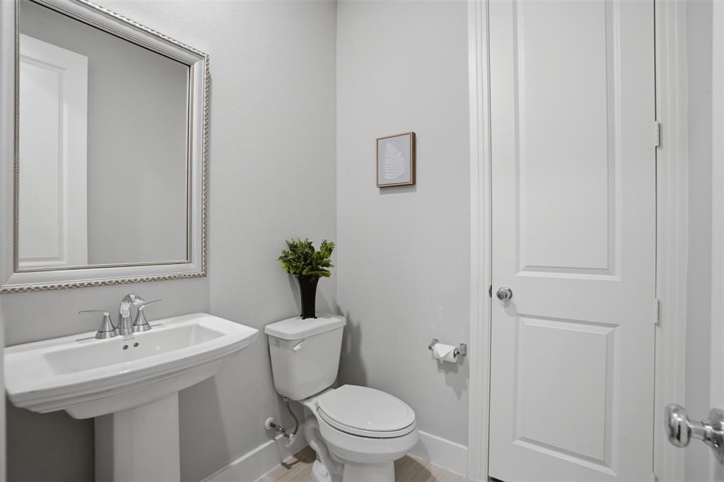 1915 Hillside Court Van Alstyne, TX 75495 - Photo 11 of 36 Half bath