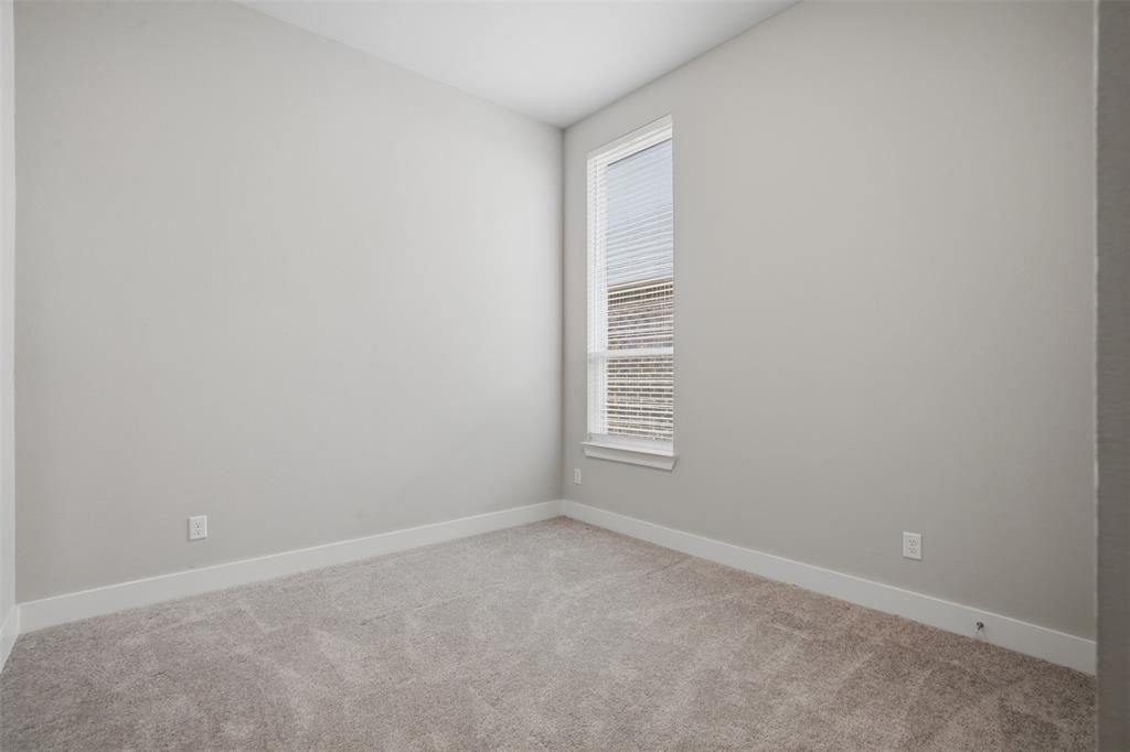 1915 Hillside Court Van Alstyne, TX 75495 - Photo 12 of 36 Guest bedroom 1