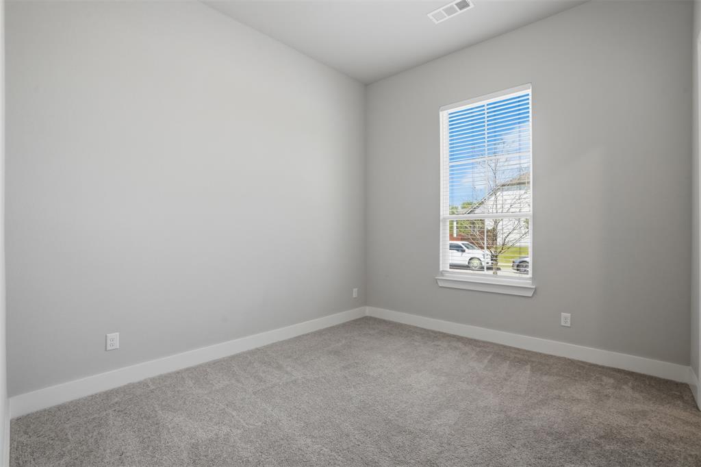 1915 Hillside Court Van Alstyne, TX 75495 - Photo 14 of 36 Guest bedroom 2