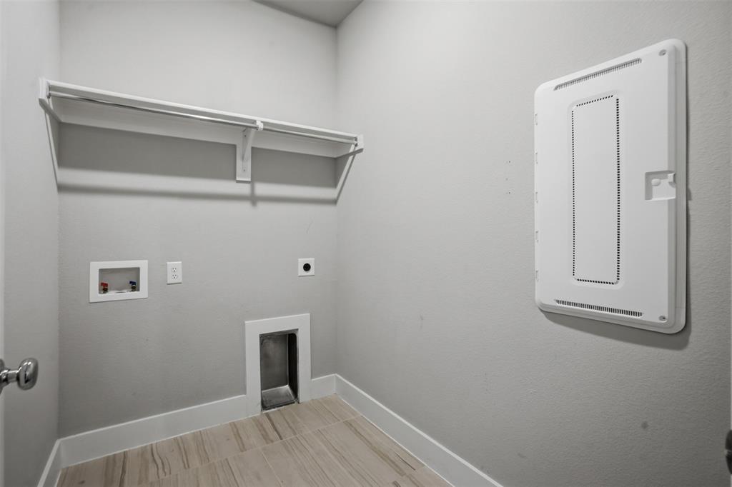 1915 Hillside Court Van Alstyne, TX 75495 - Photo 18 of 36 spacious laundry room
