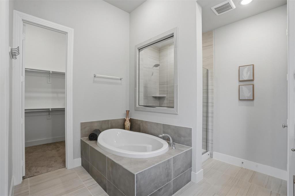 1915 Hillside Court Van Alstyne, TX 75495 - Photo 23 of 36 Garden tub with separate shower