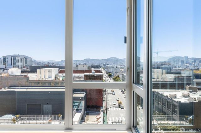 a view of a living room and entry way