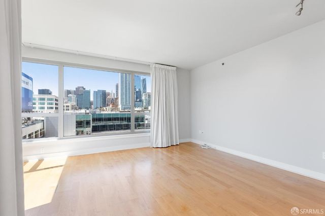 a view of a room with a large window