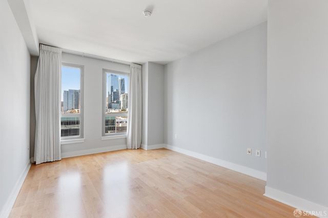 a view of a hallway with white walls