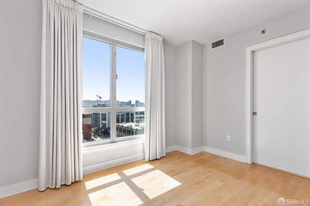 wooden floor and closet in a room