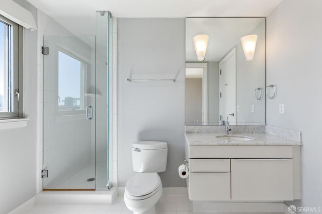 a view of a glass door with a balcony