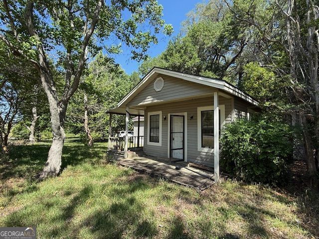 4664 Highway 37 Moultrie, GA 31768 - Photo 2 of 7 a front view of a house with a garden