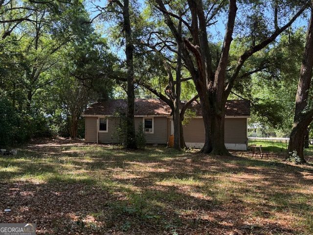 4664 Highway 37 Moultrie, GA 31768 - Photo 3 of 7 a tree is standing in between the trees