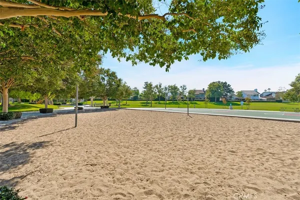a park view with a bench in the park