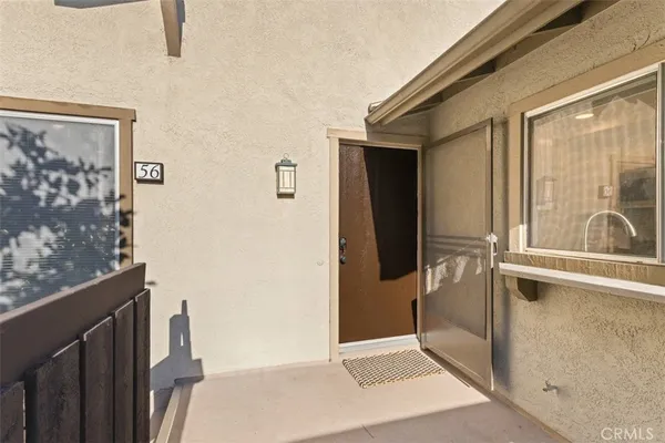a view of a bathroom with a glass door