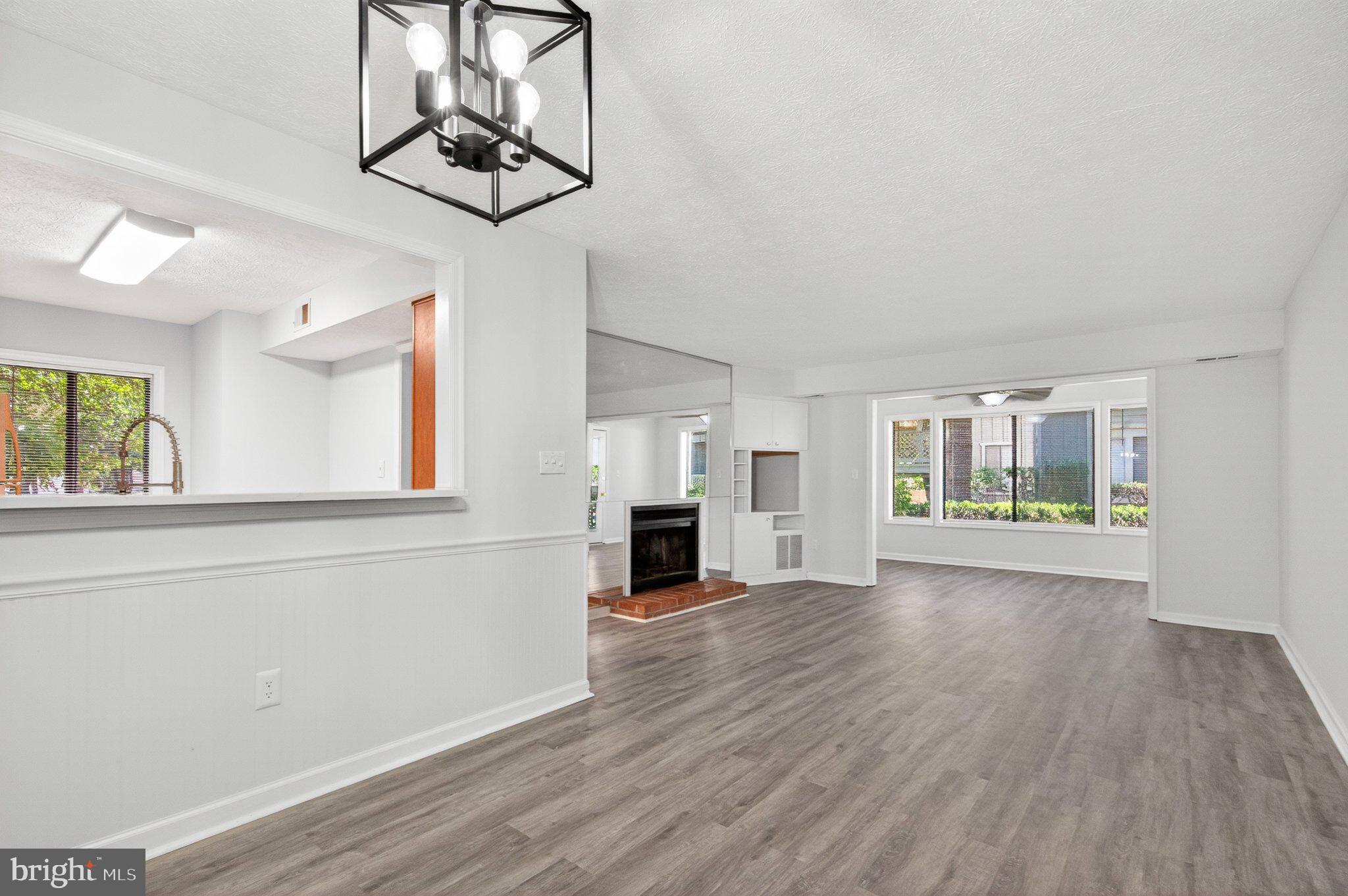 2281 Hunter's Run Drive, Unit 2281 Reston, VA 20191 - Photo 16 of 25 Bright and airy open living space.
