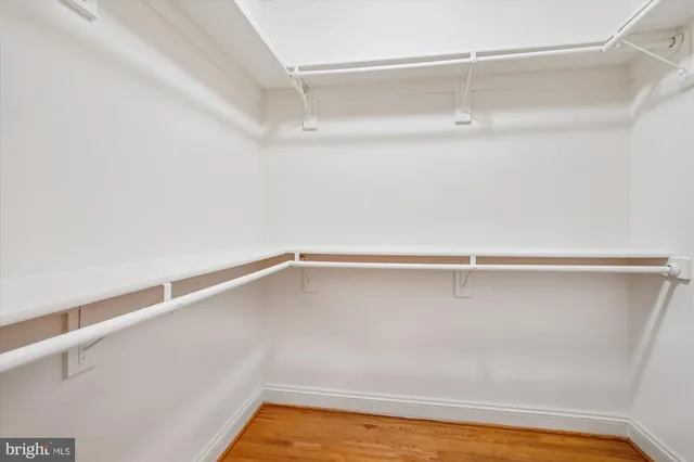 a view of an empty walk in closet