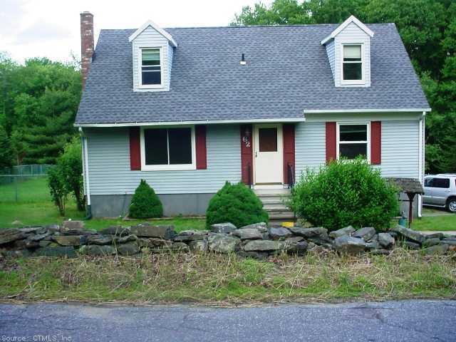 62 Pickett Road Plainfield, CT 06374 - Photo 1 of 1 a front view of a house with garden