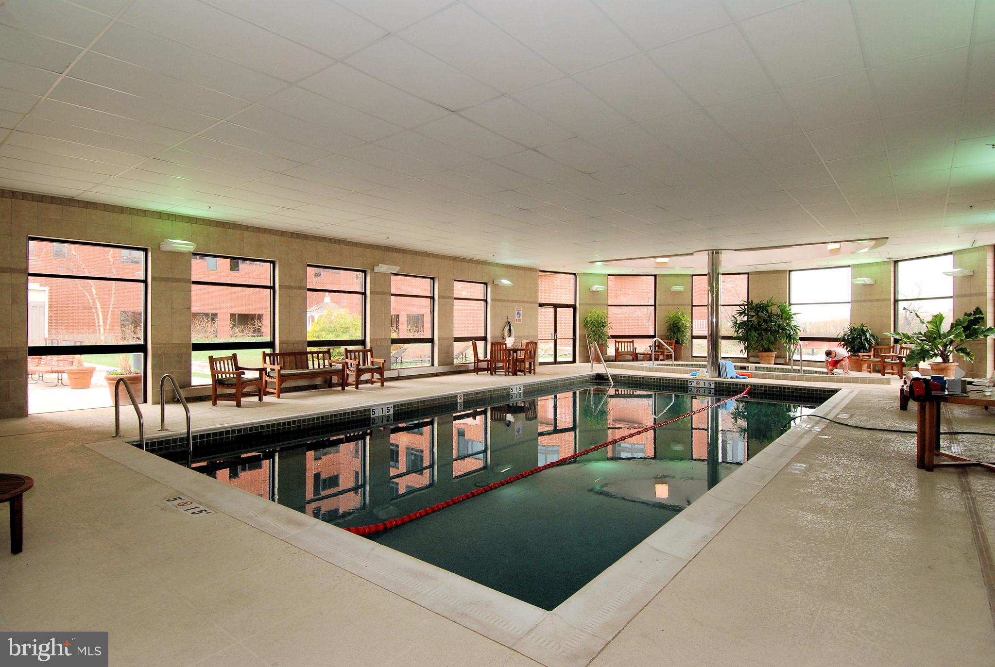 10 East Lee Street, Unit 1209 Baltimore, MD 21202 - Photo 27 of 38 a view of a living room and dining room