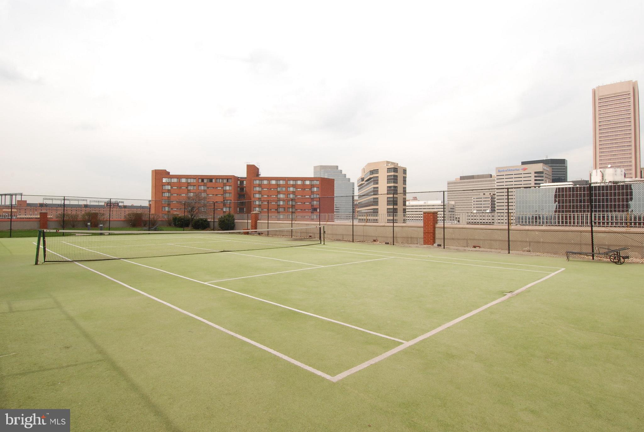 10 East Lee Street, Unit 1209 Baltimore, MD 21202 - Photo 29 of 38 a view of a tennis court