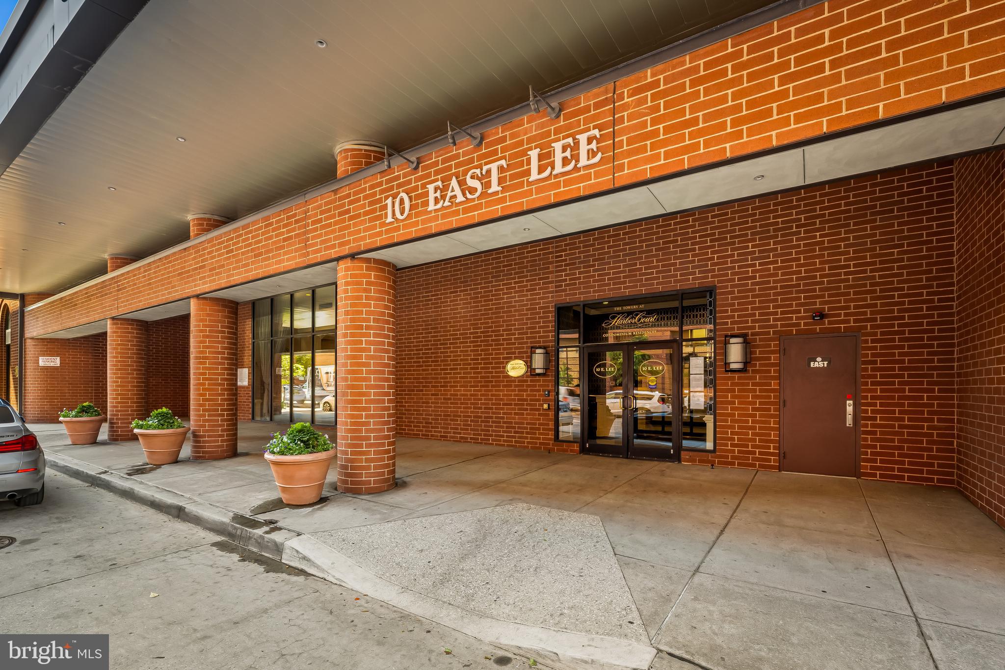 10 East Lee Street, Unit 1209 Baltimore, MD 21202 - Photo 3 of 38 a view of a building with car parked