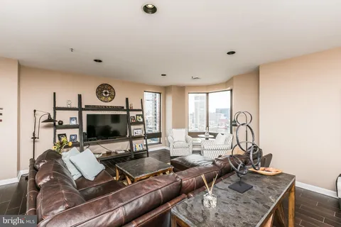 a kitchen with a table and chairs in it