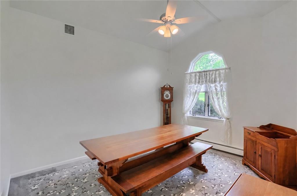 481 Chicora Fenelton Road Chicora, PA 16025 - Photo 11 of 50 Dining area with elevated ceiling, natural light, and open connection to the main living spaces.