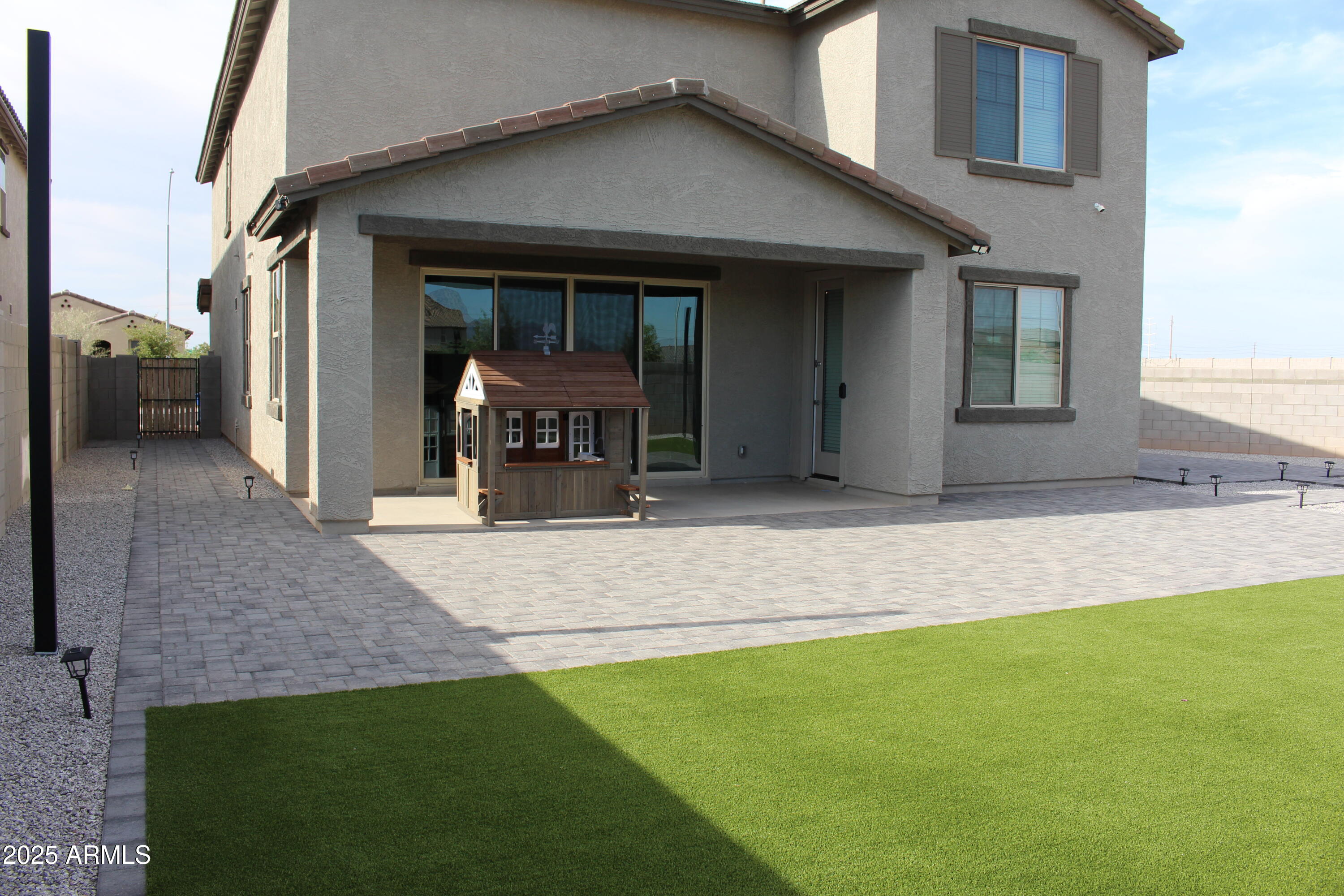 10805 West Levi Drive Tolleson, AZ 85353 - Photo 18 of 21 a house view with a outdoor space
