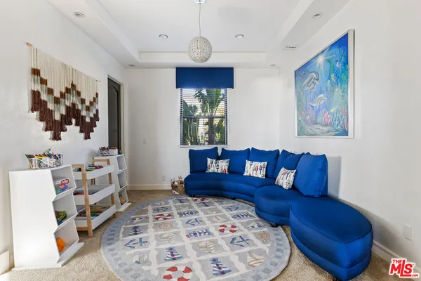 a living room with furniture and a couch