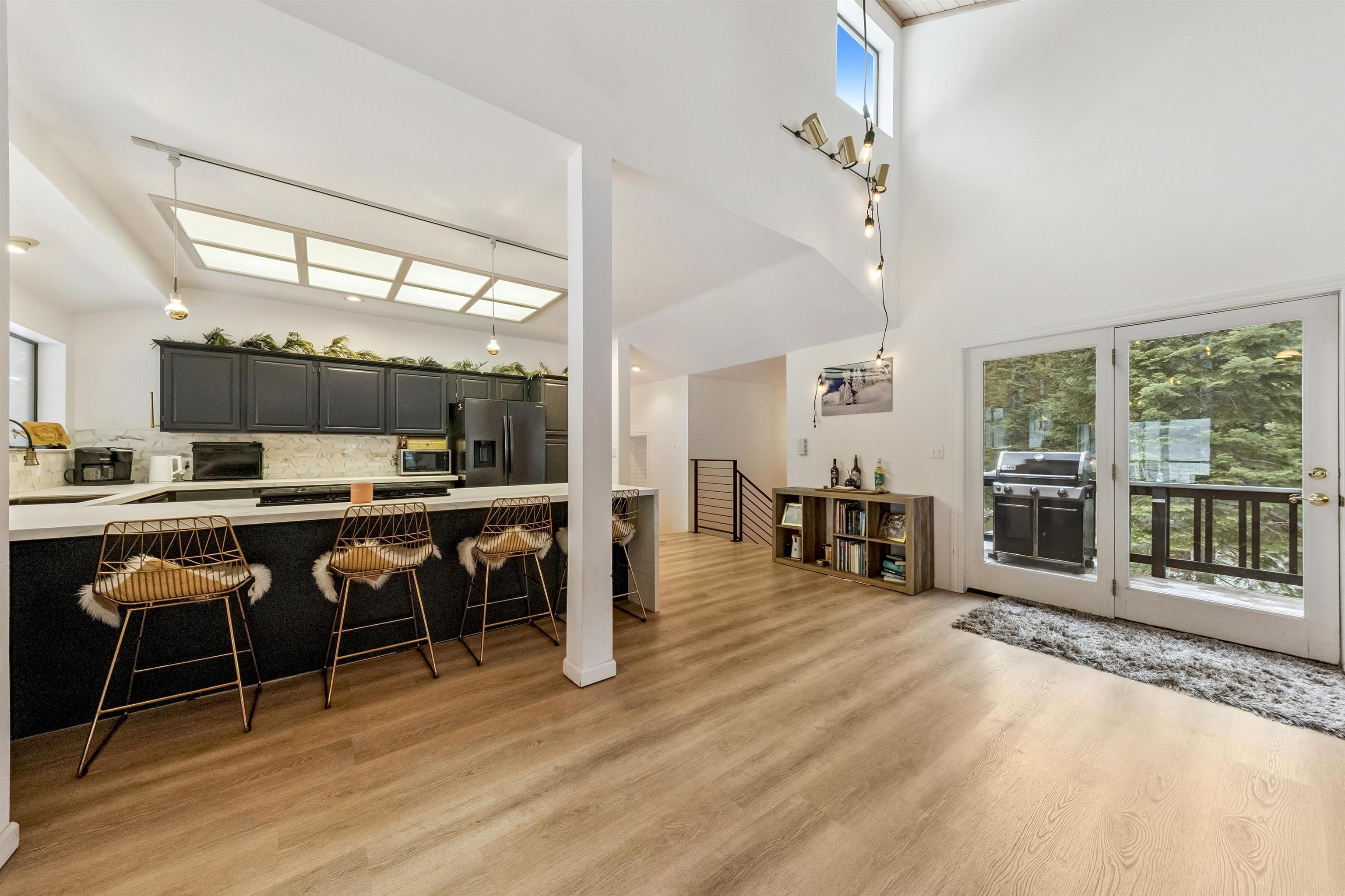 1141 Regency Way Tahoe Vista, CA 96148 - Photo 11 of 28 a view of a dining room with furniture window and wooden floor