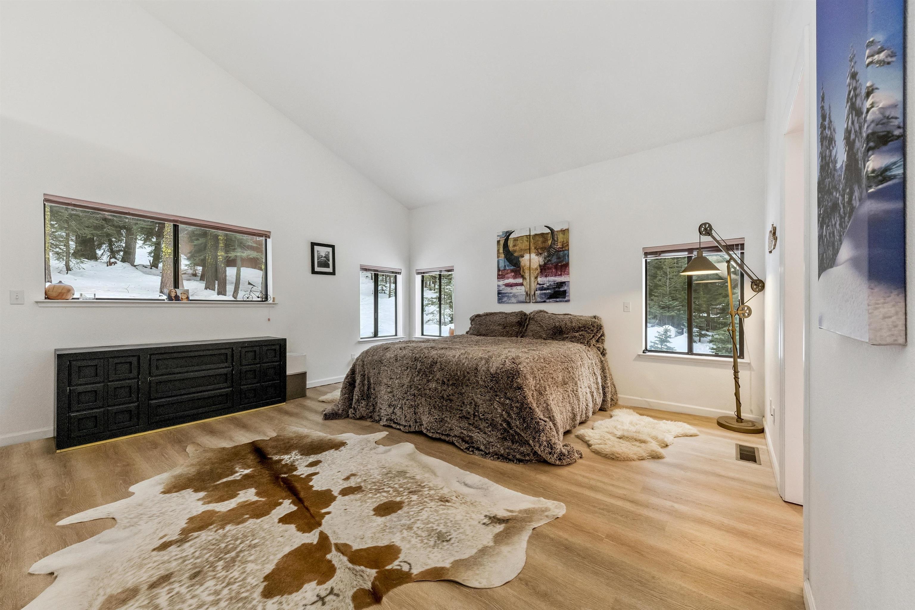 1141 Regency Way Tahoe Vista, CA 96148 - Photo 20 of 28 a bedroom with a bed dresser and a window