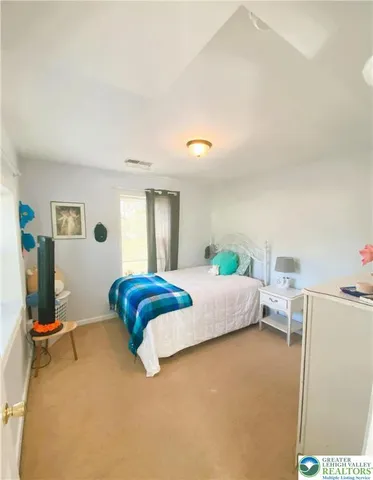a view of livingroom with furniture and toys