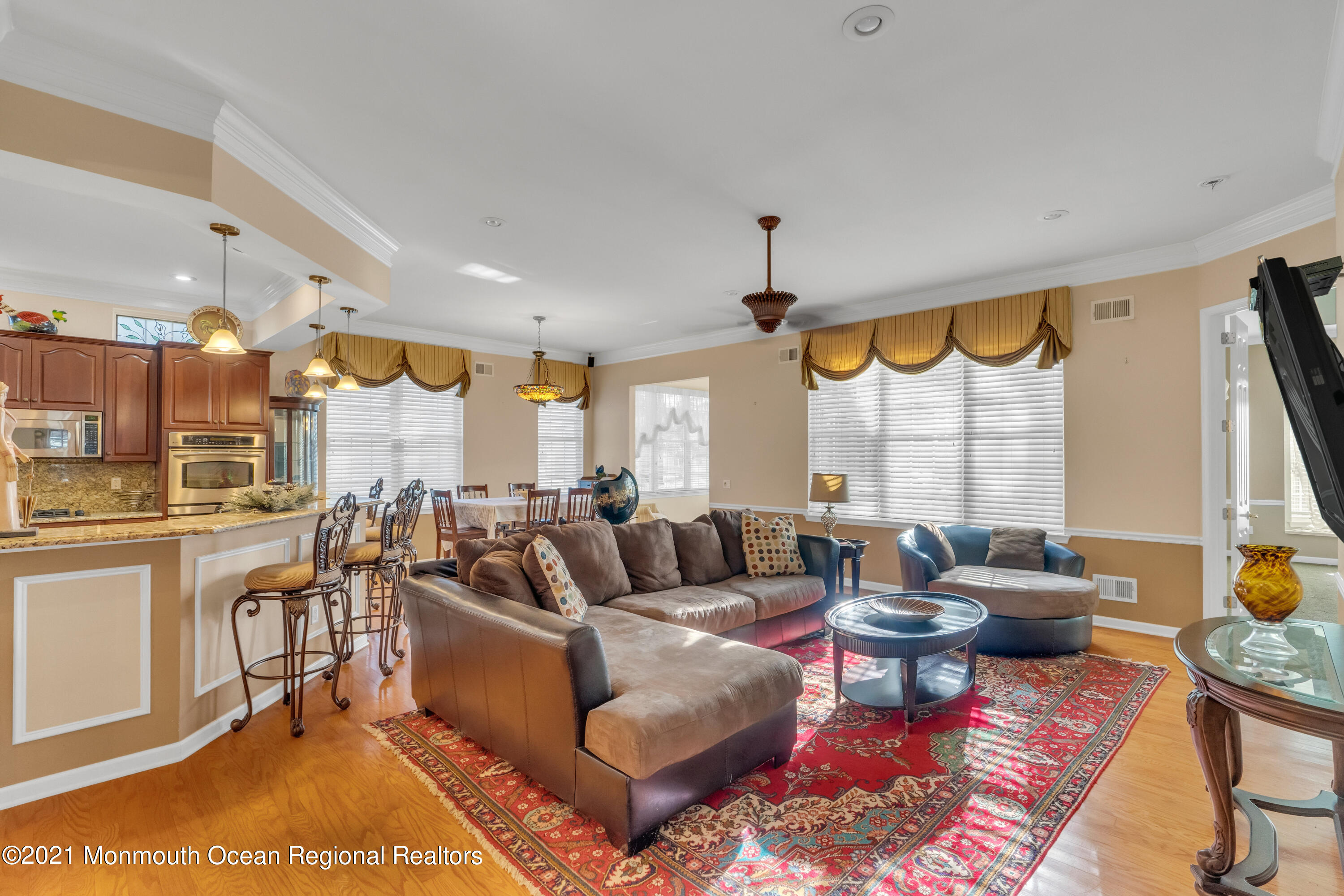 32 Crooked Stick Road Jackson, NJ 08527 - Photo 11 of 33 a living room with furniture fireplace and a large window