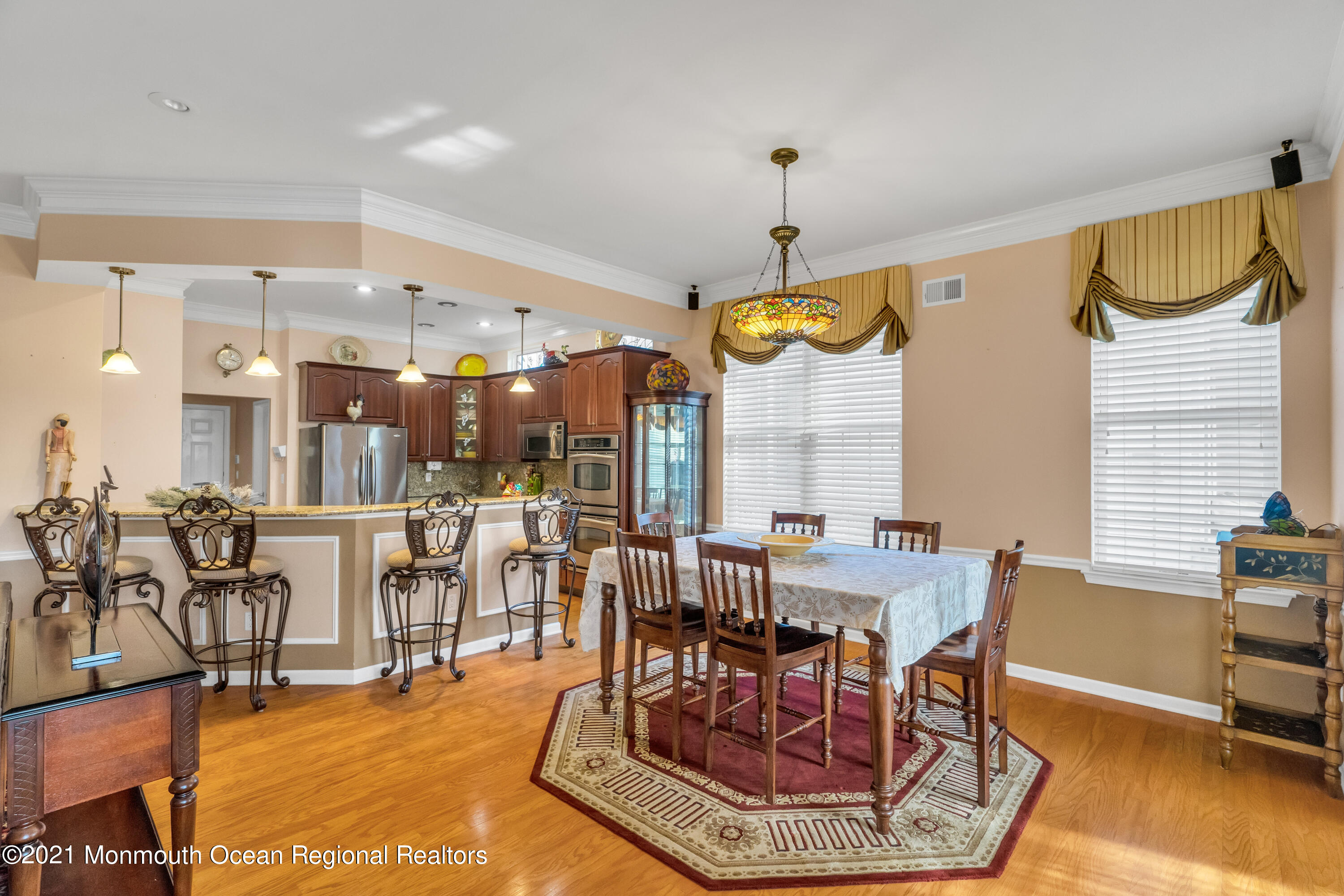 32 Crooked Stick Road Jackson, NJ 08527 - Photo 14 of 33 a view of a dining room with furniture window and wooden floor