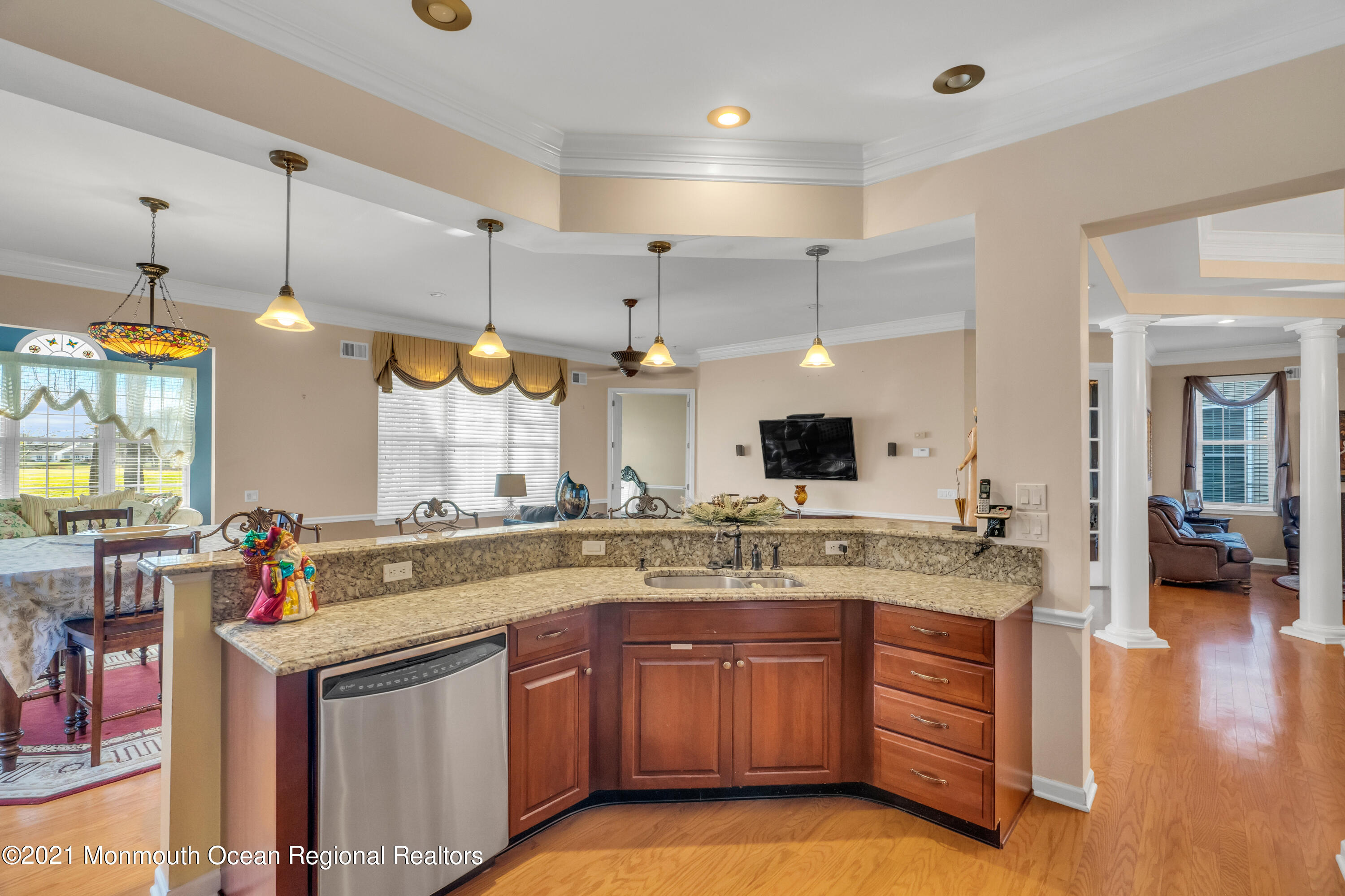 32 Crooked Stick Road Jackson, NJ 08527 - Photo 17 of 33 a kitchen with a sink stove and cabinets