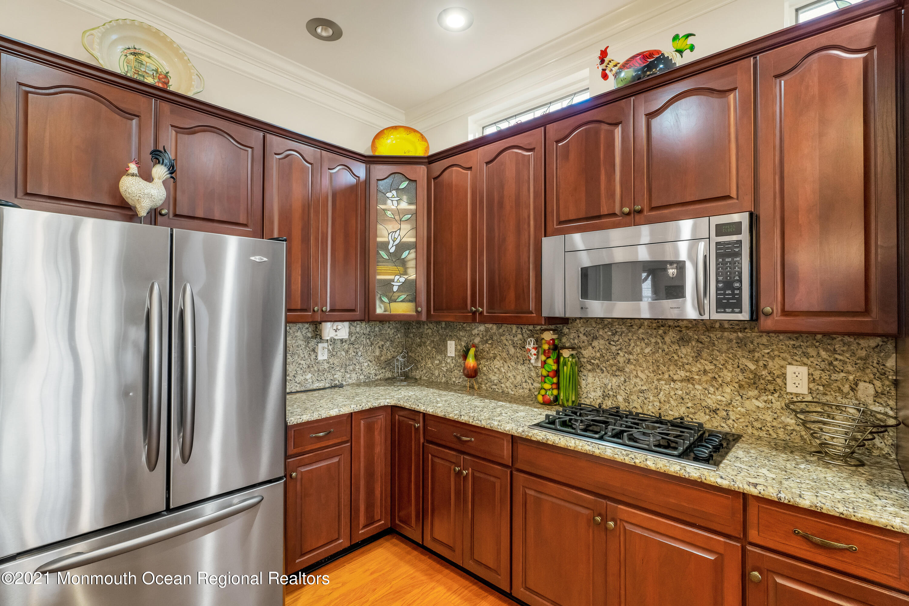32 Crooked Stick Road Jackson, NJ 08527 - Photo 18 of 33 a kitchen with stainless steel appliances granite countertop a refrigerator and a sink