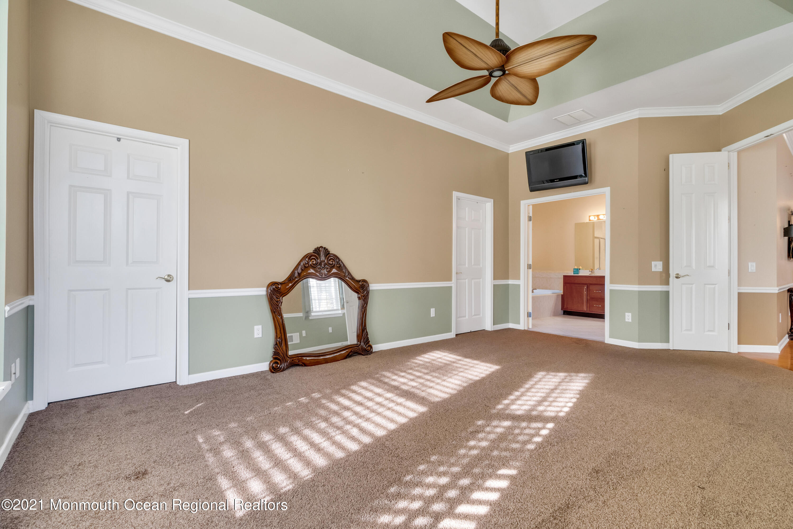 32 Crooked Stick Road Jackson, NJ 08527 - Photo 20 of 33 a view of a livingroom with a chandelier fan and a bathroom
