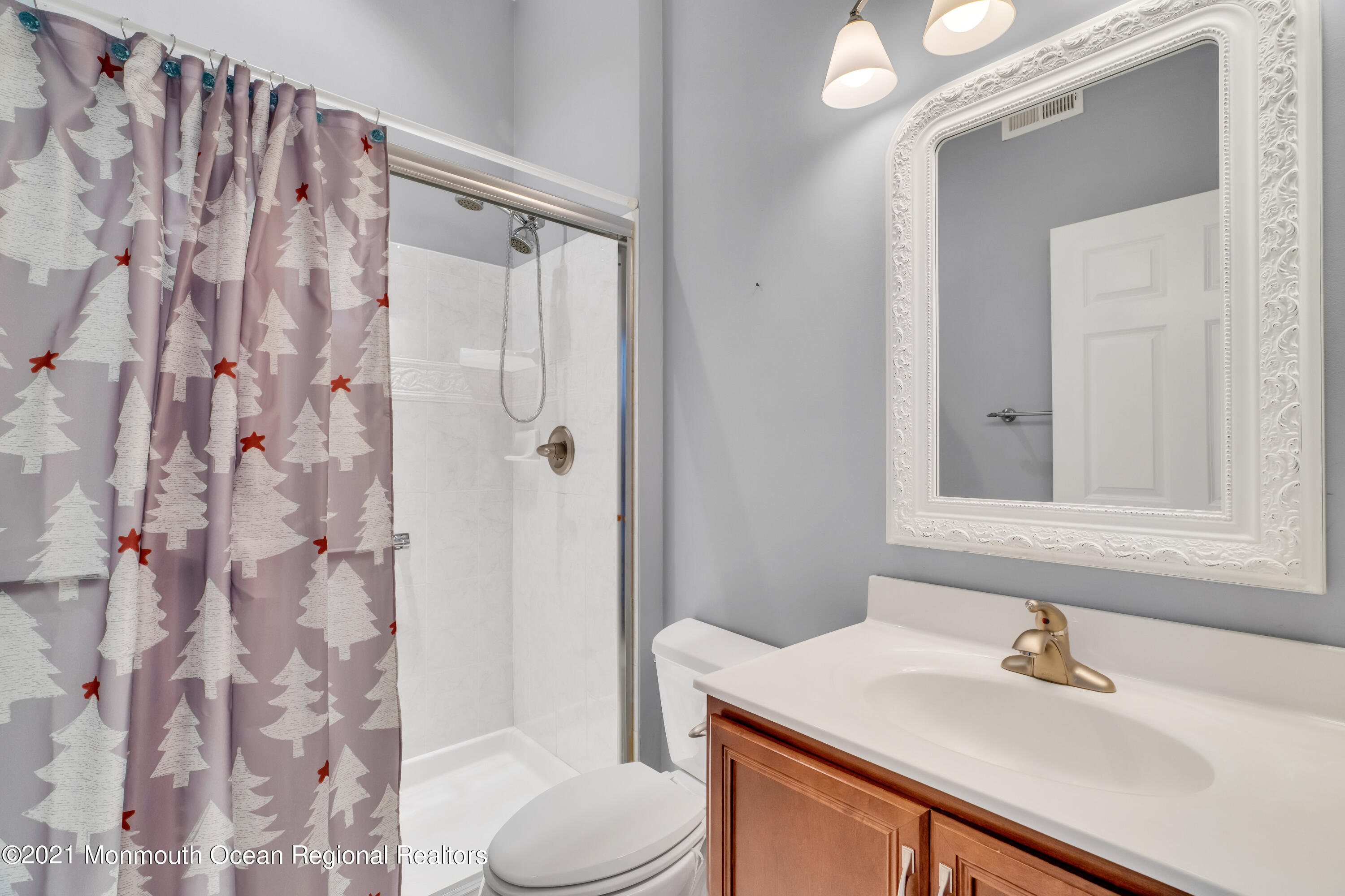 32 Crooked Stick Road Jackson, NJ 08527 - Photo 26 of 33 a bathroom with a sink toilet and shower