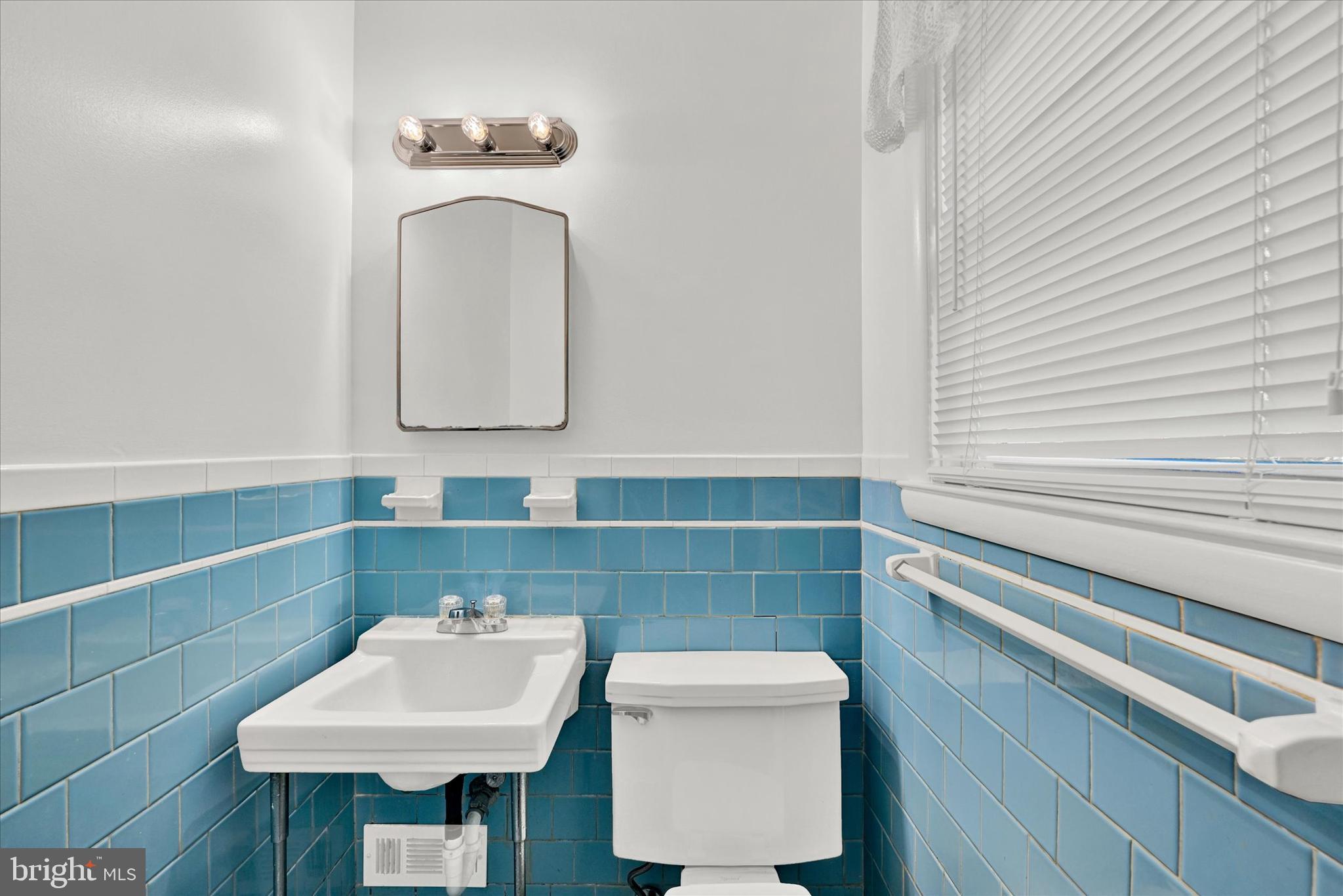 6754 Glenkirk Road Baltimore, MD 21239 - Photo 12 of 24 Primary Bedroom Powder Room