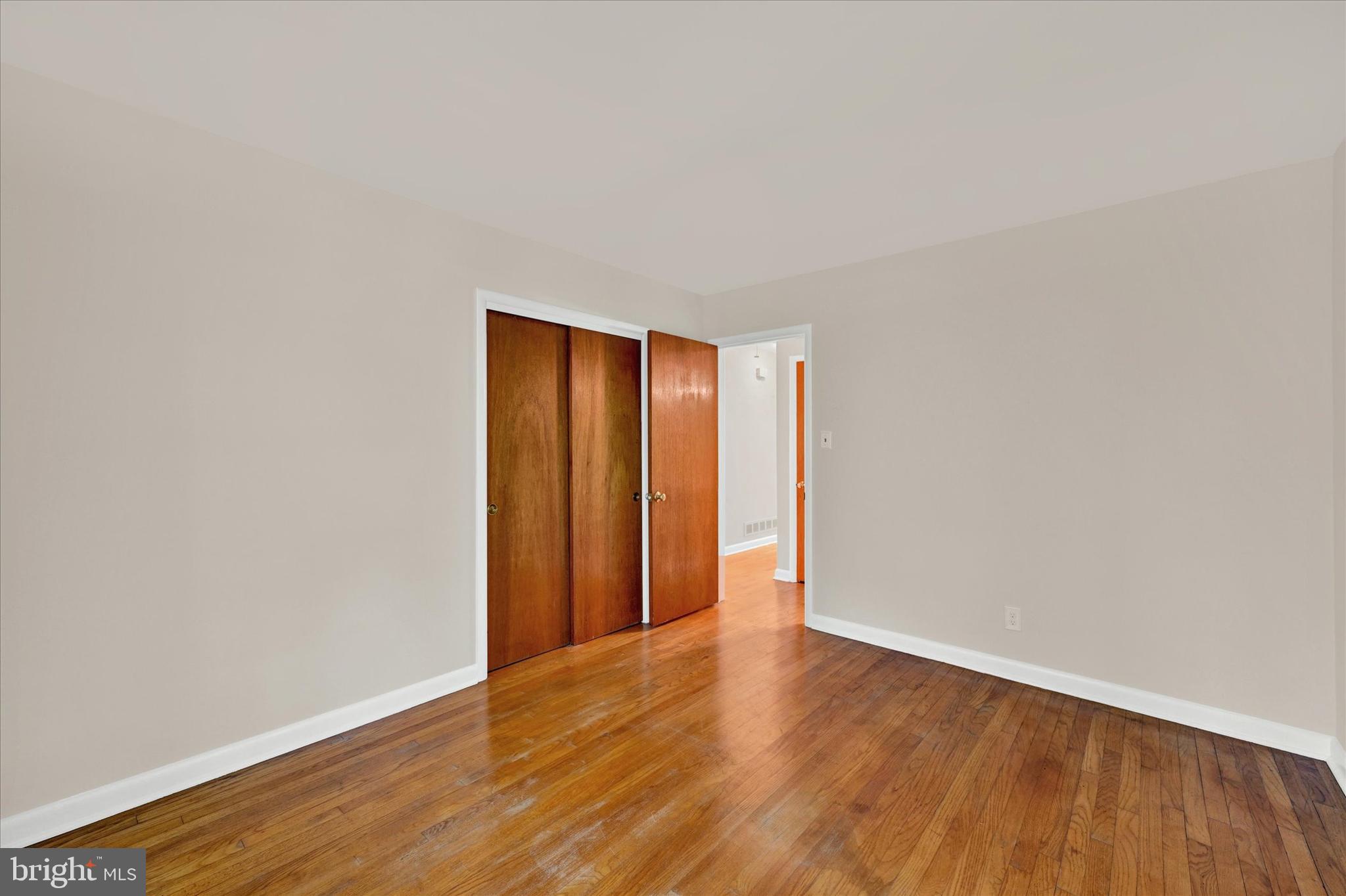 6754 Glenkirk Road Baltimore, MD 21239 - Photo 14 of 24 Freshly Painted Bedroom 2