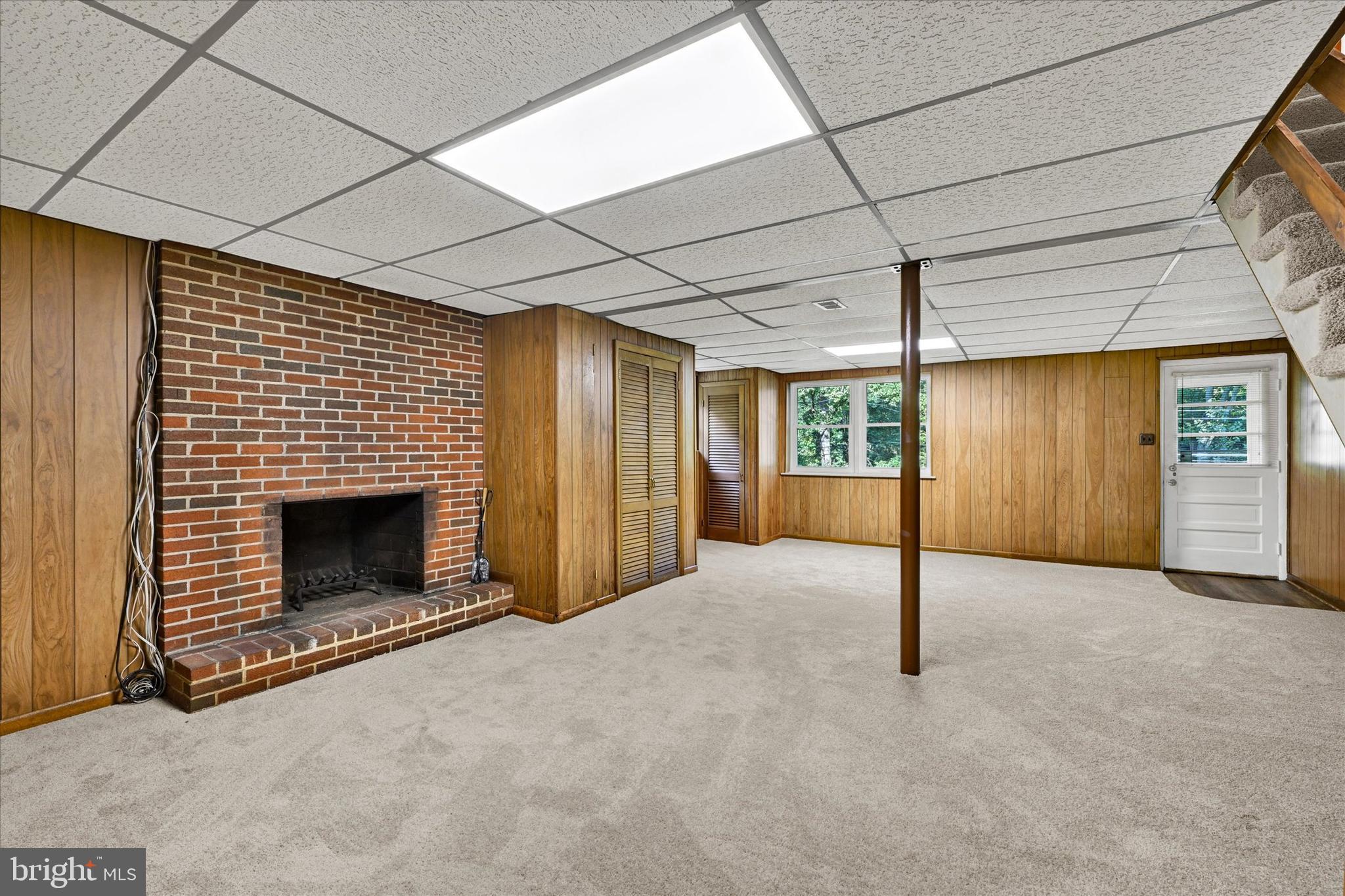 6754 Glenkirk Road Baltimore, MD 21239 - Photo 17 of 24 Family Room w/Wood Burning Fireplace