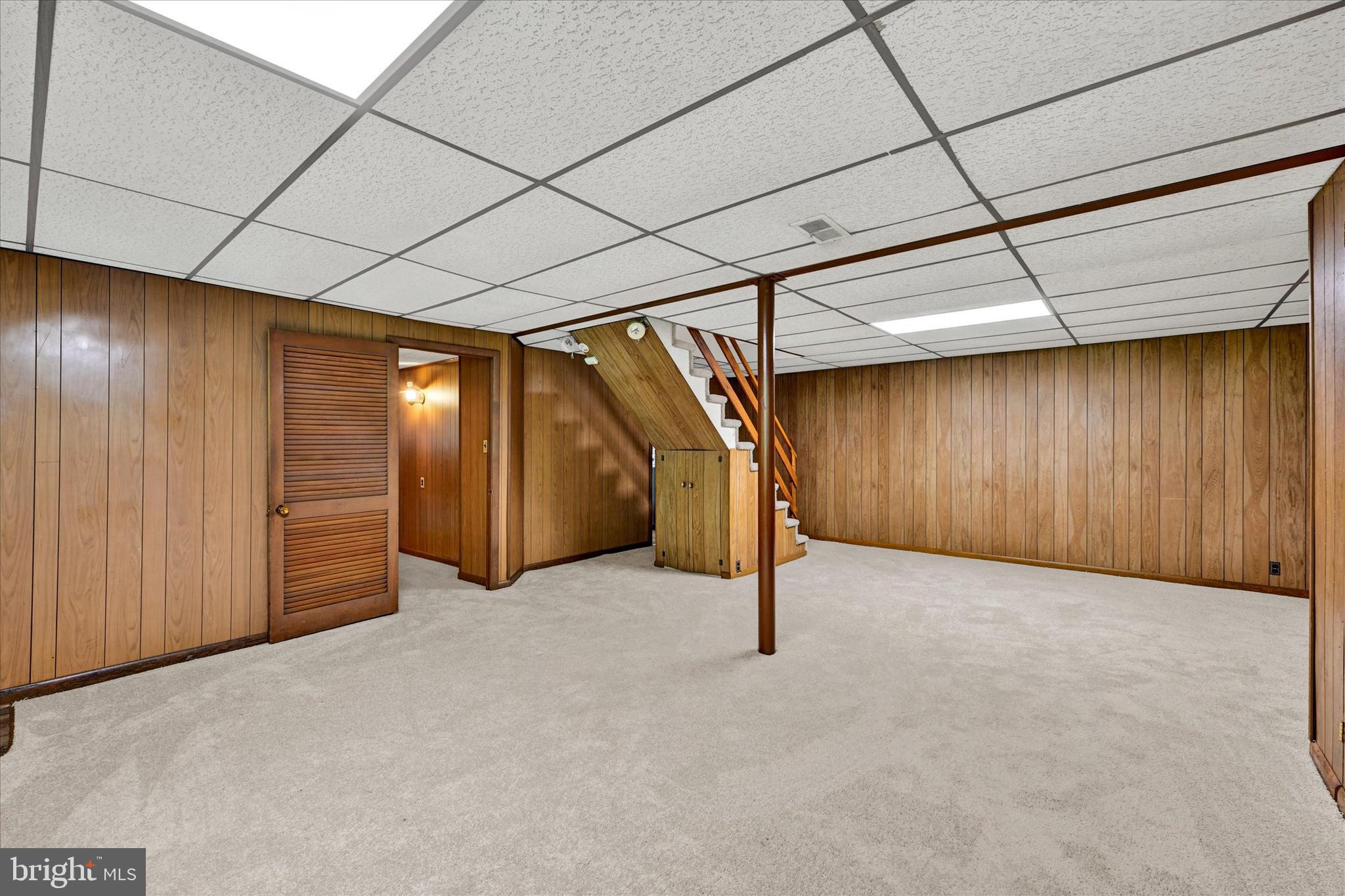 6754 Glenkirk Road Baltimore, MD 21239 - Photo 18 of 24 Family Room with New Carpet